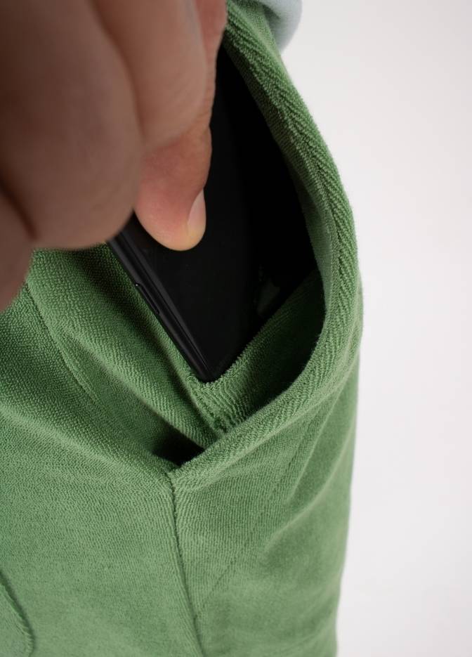 STONE GREEN TOWEL SHORTS closeup - phone pocket - men's shorts with hidden pocket for smartphones